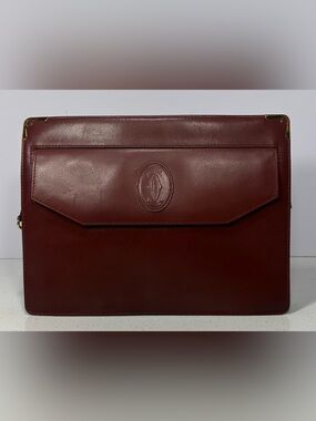Cartier Vintage Must Line clutch bag in burgundy leather.